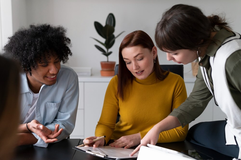 Diversity in the workplace, team reviewing success metrics in a meeting with inclusive representation
