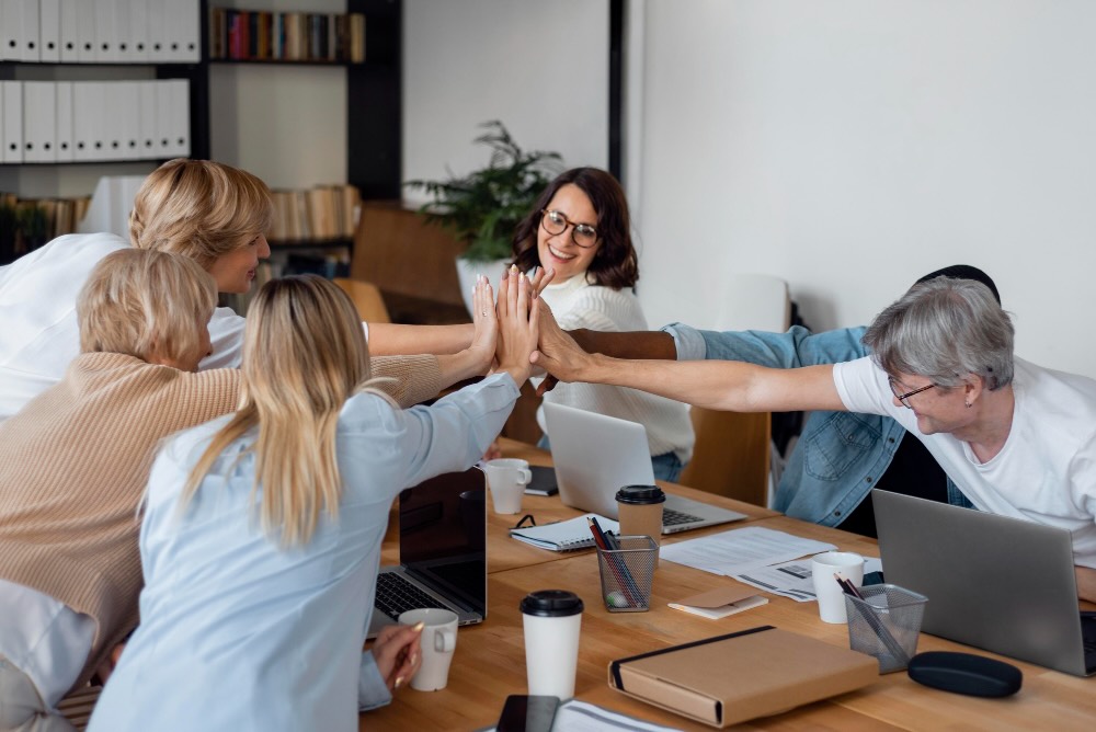 Group of employees working together in a safe work environment - Diversity Inclusion New Zealand